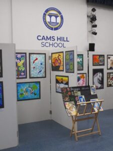 Art exhibits under the Cams logo.